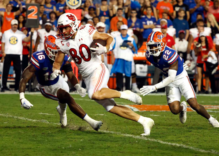 Utah Utes tight end Brant Kuithe (80) runs with the ball against the Florida Gators during the second quarter at Steve Spurrier-Florida Field.